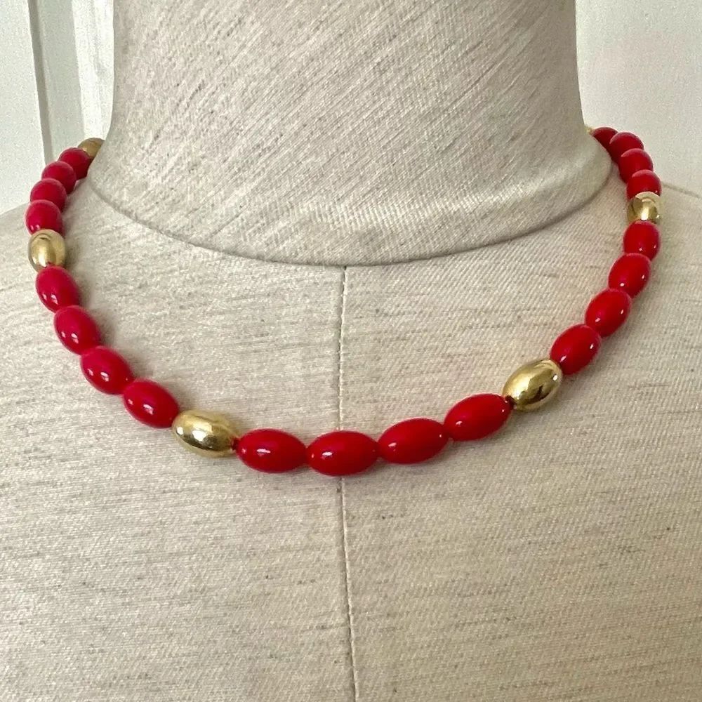 Red and gold tone beaded necklace